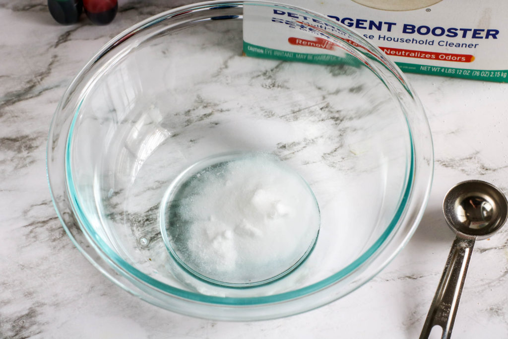 Mixing together borax and water ingredients needed to make homemade bouncy balls make your own bouncy balls