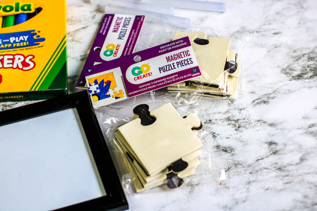 supplies needed to make a homemade dad birthday card using a frame, magnetic puzzle pieces