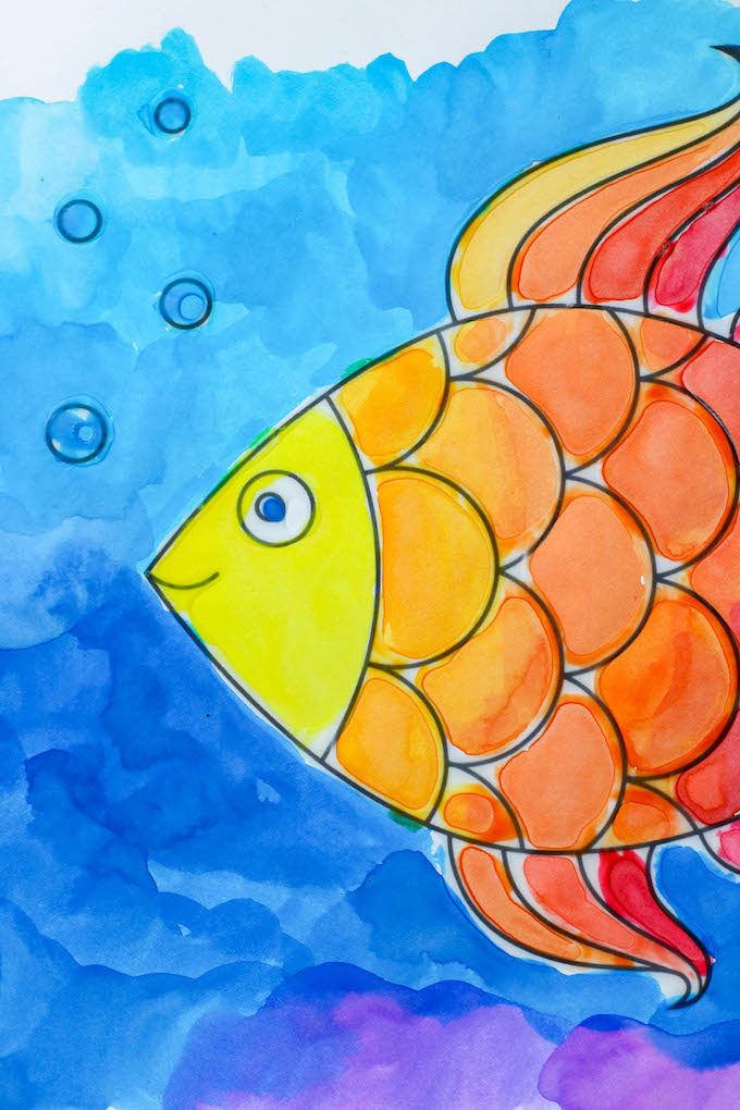 Watercolor painted fish picture rainbow fish free template rainbow fish outline perfect for preschoolers, kindergarten, first grade, second grade, third grade, fourth grade fifth grade