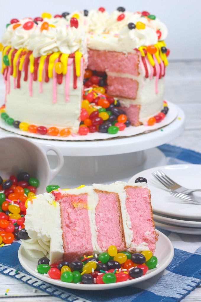 cake layer with frosting and a fun surprise in the center for the Jelly Bean Cake