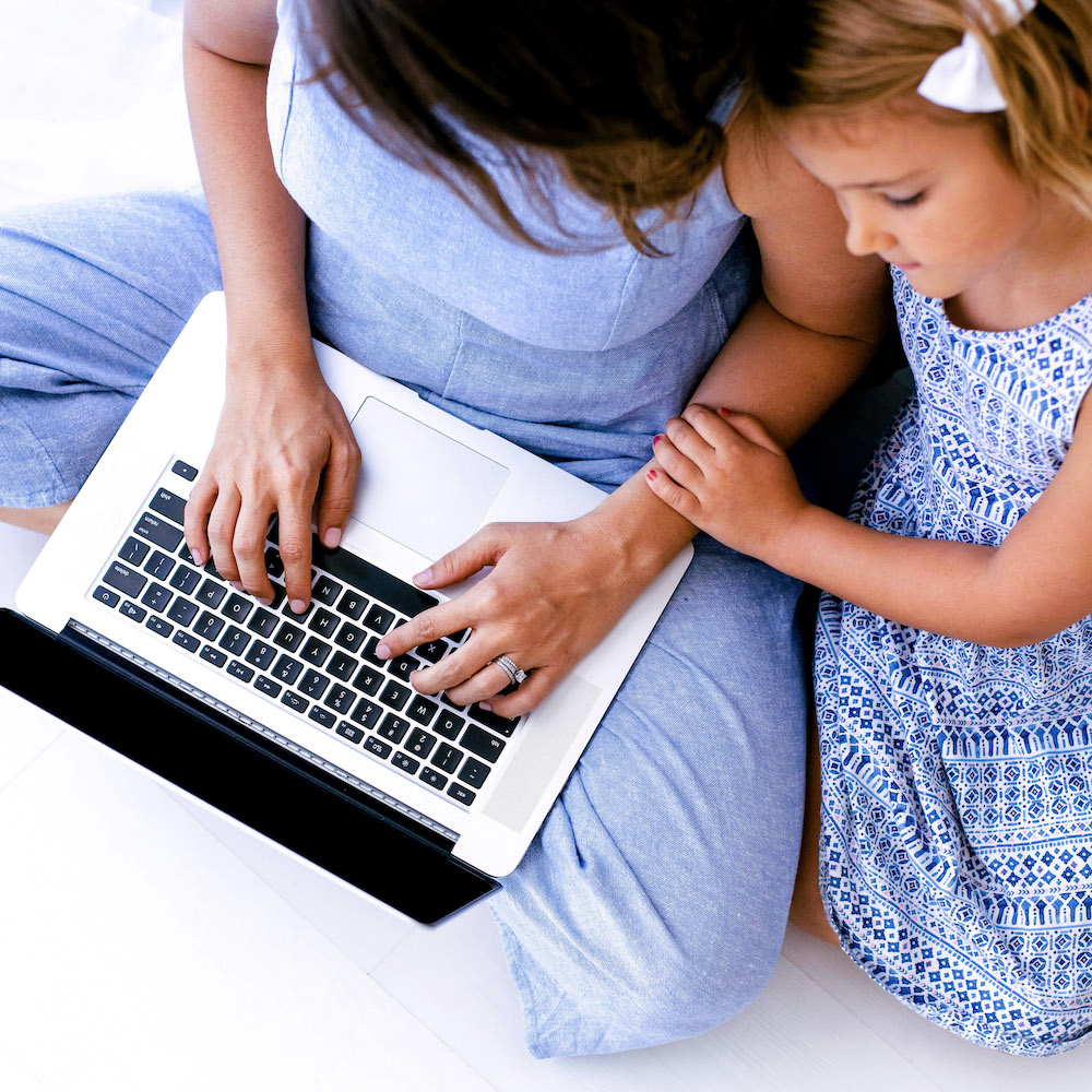 mom and child on computer