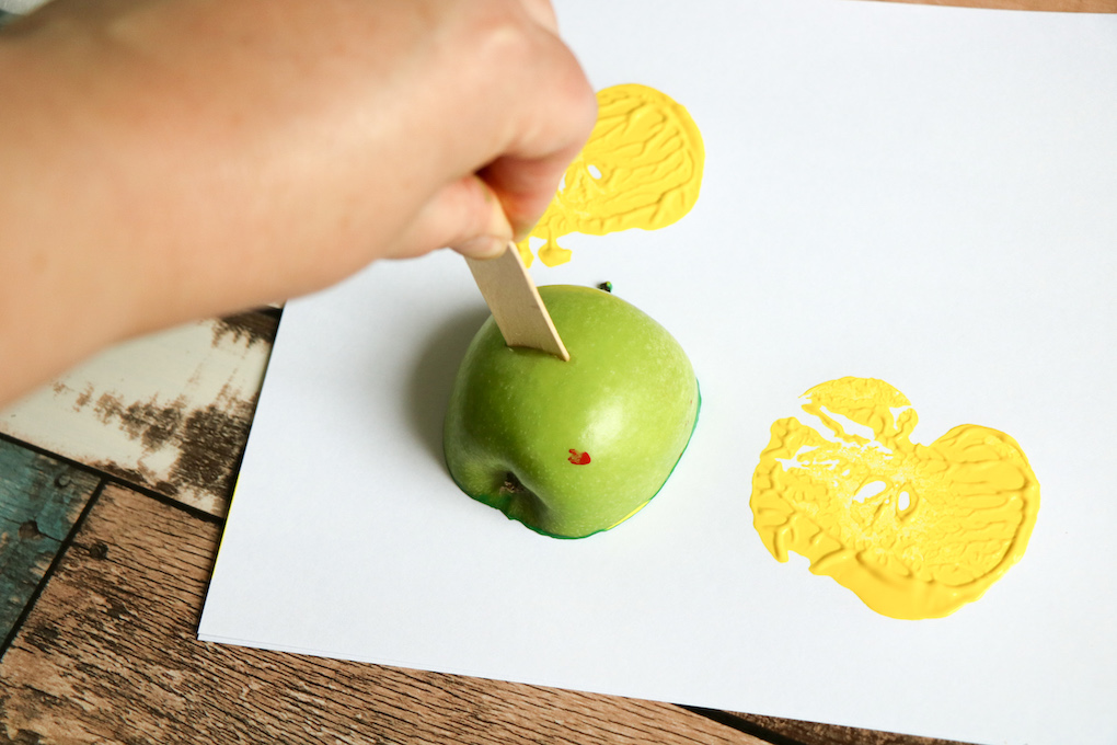 apple stamping in yellow paint