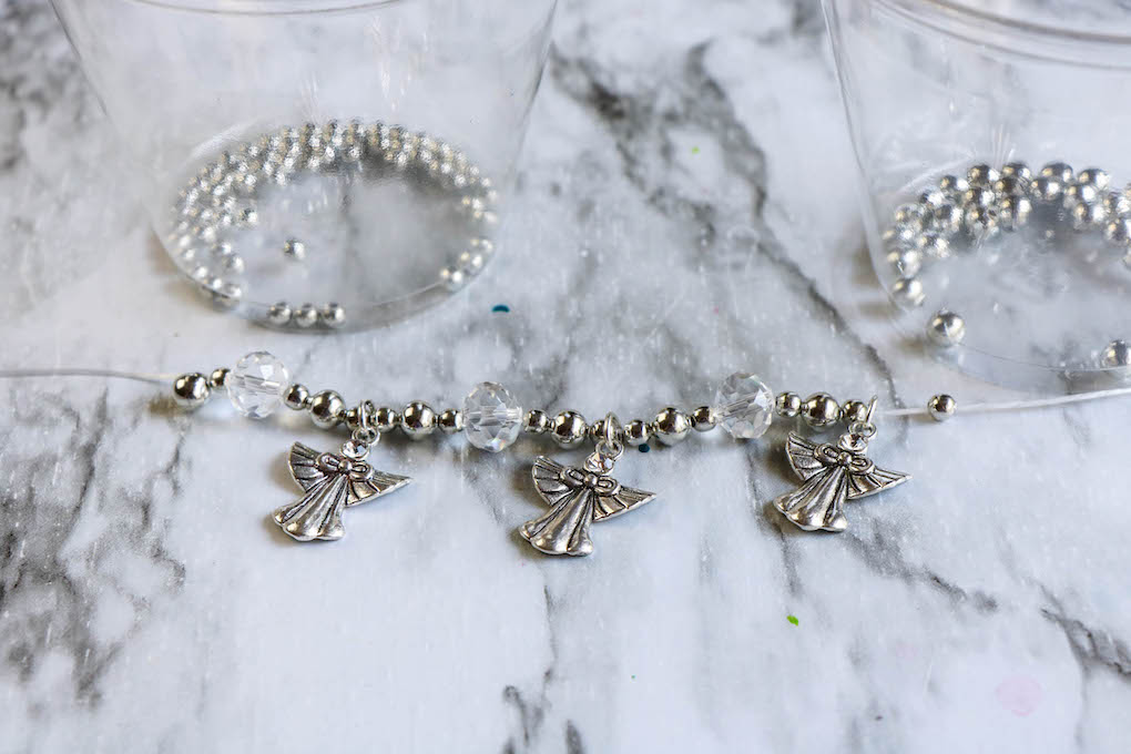 Supplies needed to make a DIY Angel charm bracelet