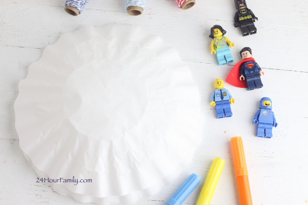 Making a lego parachute with coffee filters and legos
