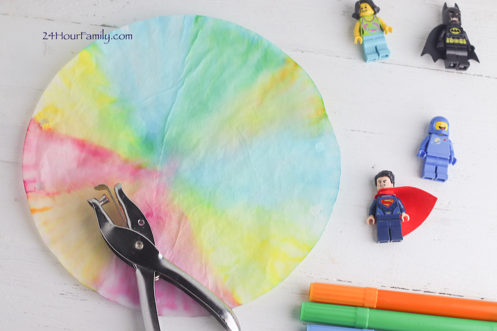 Making a lego parachute with coffee filters and legos