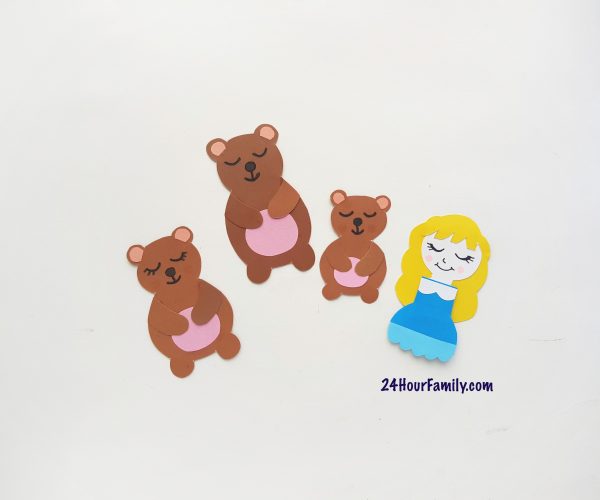 Draw the faces on goldilocks and the three bears using a sharpie