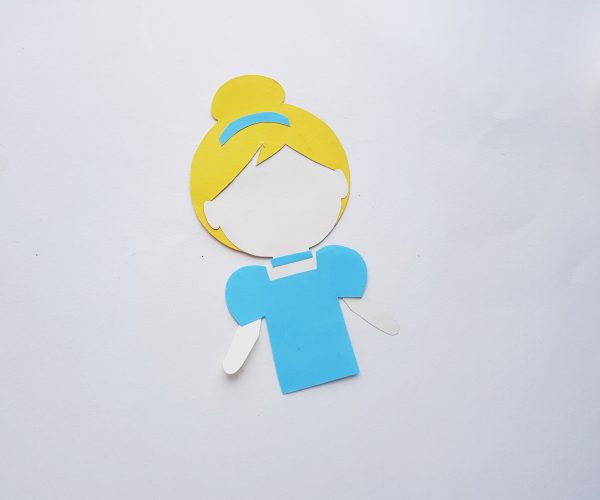 using yellow, white ad blue papers to make a Cinderella craft 