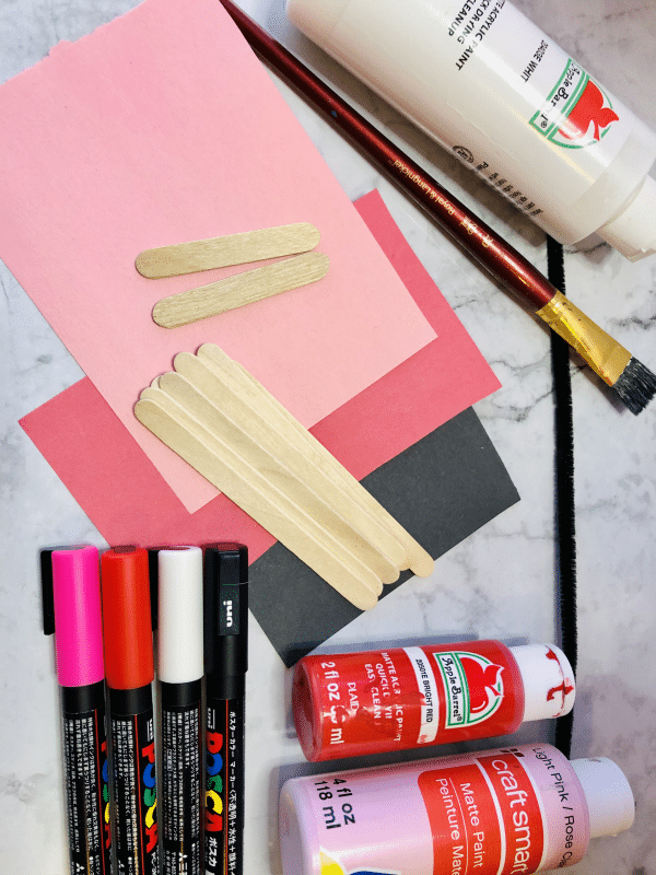 supplies needed to make a popsicle stick valentine's craft