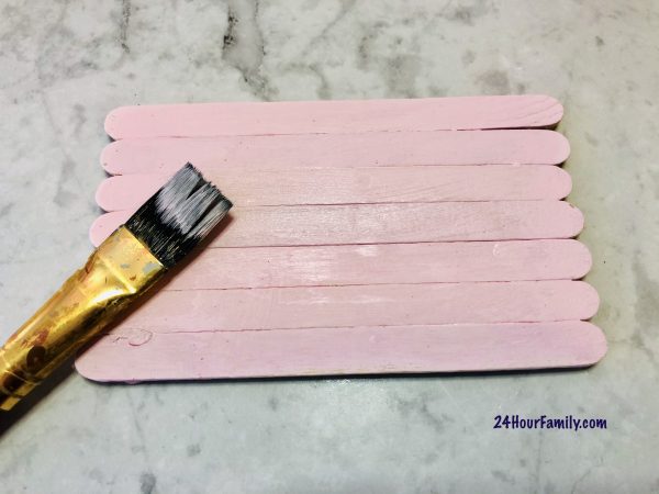 use acrylic paint to paint popsicle sticks
