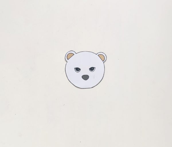cut out head with eyes for polar bear paper roll craft winter activity for kids