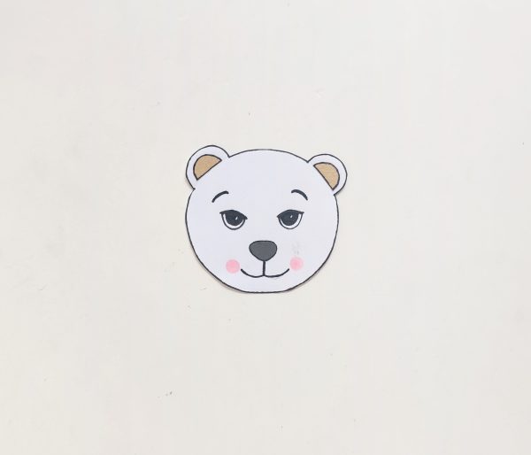 cut out polar bear face for polar bear paper roll craft winter activity for kids