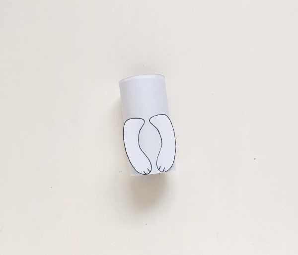 toilet paper roll with cut out hand for polar bear paper roll craft winter activity for kids