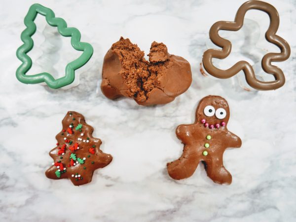 Making homemade nutella playdough for christmas gingerbread cutouts christmas tree cutouts