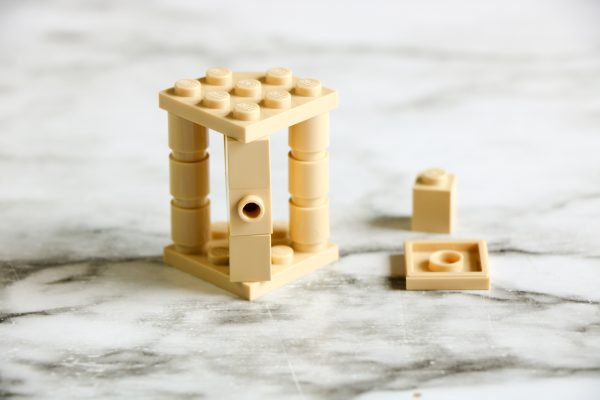 how to build a simple lego nativity scene with a lego manger, a lego stable to hold baby Jesus and a Lego baby Jesus