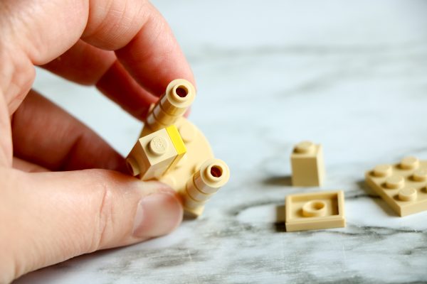 how to build a simple lego nativity scene with a lego manger, a lego stable to hold baby Jesus and a Lego baby Jesus