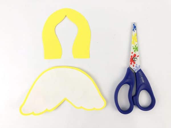 Angel cutout template with white glue and colorful scissors, How to Make an Angel Toilet paper Craft with Free Angel template, DIY Angel Toilet Paper Craft with yellow halo and wings, Angel Craft, Angel Toilet paper Roll, Angel' Wings, Crafts For Kids, Craft supplies for angel DIY: paper roll, scissors, markers, and glue, Cut-out angel craft pieces and colorful scissors