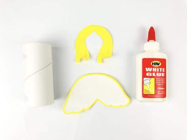 Yellow angel hair cutout beside colorful scissors, Angel cutout template with white glue and colorful scissors, How to Make an Angel Toilet paper Craft with Free Angel template, DIY Angel Toilet Paper Craft with yellow halo and wings, Angel Craft, Angel Toilet paper Roll, Angel' Wings, Crafts For Kids, Craft supplies for angel DIY: paper roll, scissors, markers, and glue, Cut-out angel craft pieces and colorful scissors