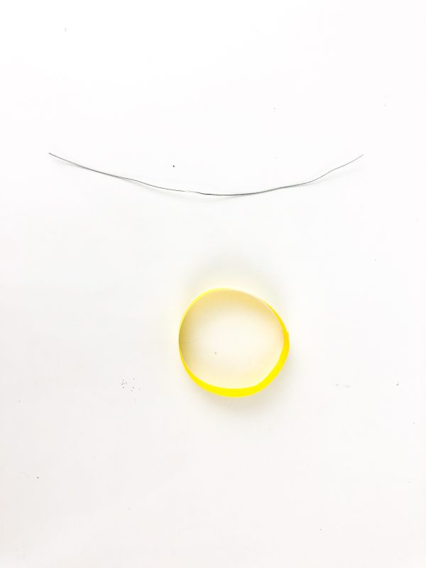 Yellow angel hair cutout beside colorful scissors, Angel cutout template with white glue and colorful scissors, How to Make an Angel Toilet paper Craft with Free Angel template, DIY Angel Toilet Paper Craft with yellow halo and wings, Angel Craft, Angel Toilet paper Roll, Angel' Wings, Crafts For Kids, Craft supplies for angel DIY: paper roll, scissors, markers, and glue, Cut-out angel craft pieces and colorful scissors, Toilet paper roll angel with yellow hair and pink and black markers