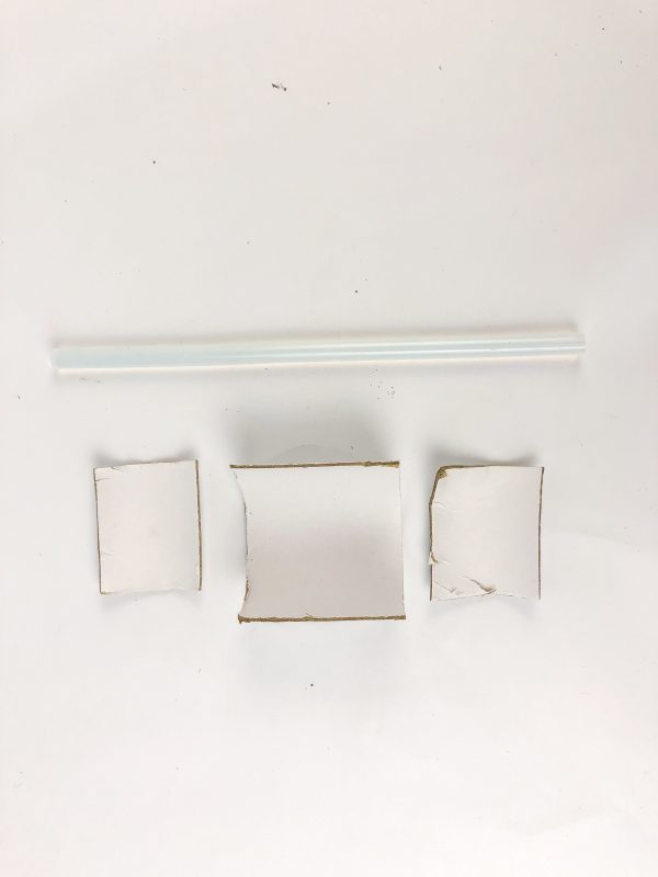 supplies needed to make a baby jesus in a manger craft using yarn and toilet paper roll
