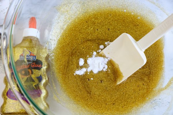 baking soda and glitter glue to make slime pot of gold slime St patricks day crafts for kids MArch 17th crafts