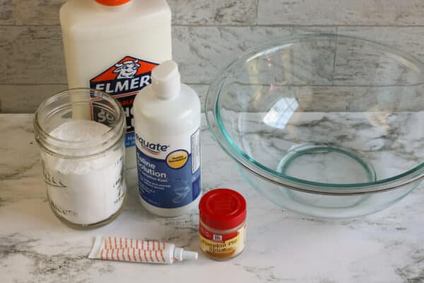 ingredients to make slime at home contact lens solution glue baking soda food coloring