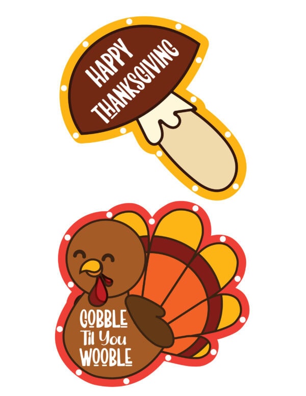 Two Thanksgiving lacing cards, one shaped like a mushroom with the text 'Happy Thanksgiving,' and the other shaped like a turkey with the phrase 'Gobble Til You Wobble.'
