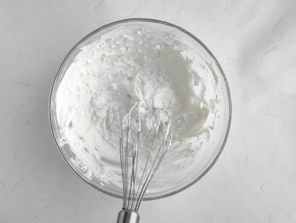 Icing or frosting used to coat the pretzels