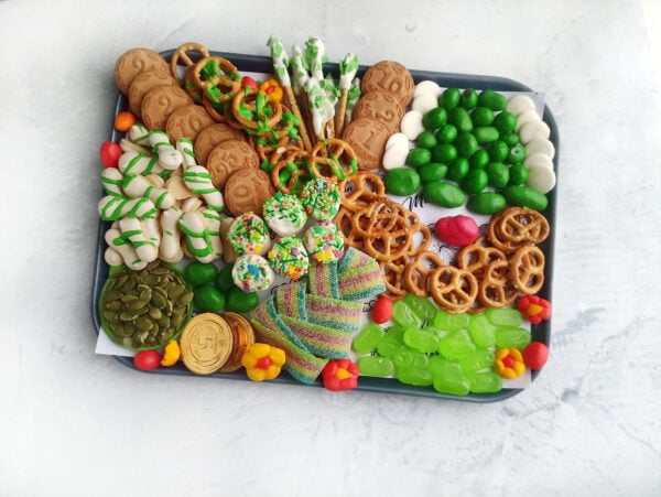 St Patricks Day food platter, lucky charm charcuterie, green and white charcuterie, festive appetizer board, Irish dessert board, cheese and meat board, Irish party platter, green fruit board, holiday snack ideas