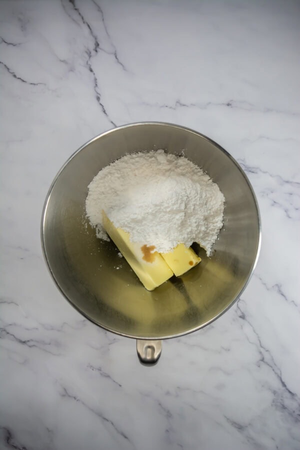 In a large bowl, whisk together the flour, cocoa powder, baking powder, baking soda, butter, and salt until well combined