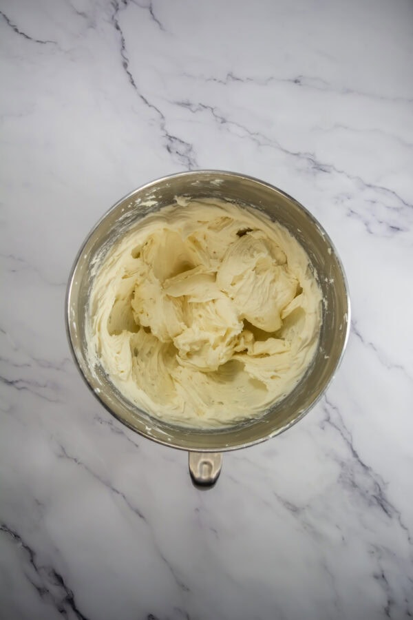 Add marshmallow fluff: Add the marshmallow fluff, vanilla extract, and a pinch of salt. Continue to beat until the frosting is light and fluffy.