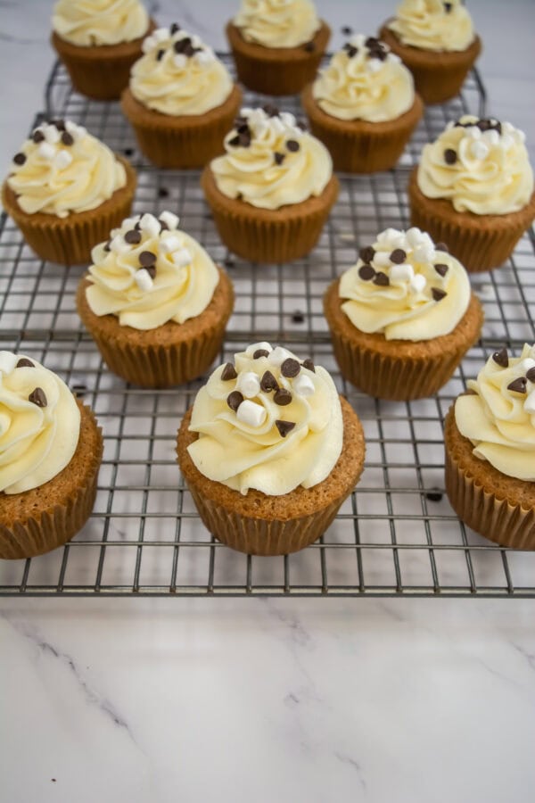 Hot Cocoa Cupcakes with Marshmallow Frosting: Decorate your hot cocoa cupcakes with marshmallow frosting