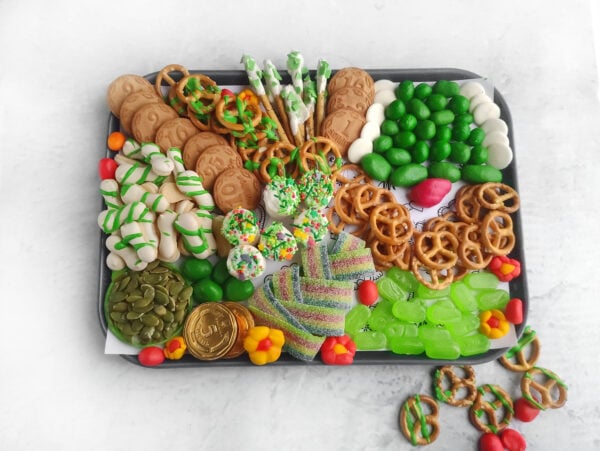 St Patricks Day celebration food, shamrock-themed charcuterie, easy St Patricks Day snacks, festive green snacks, lucky treats, St Patricks Day cheese and cracker board, green food platter, St Patricks Day entertaining