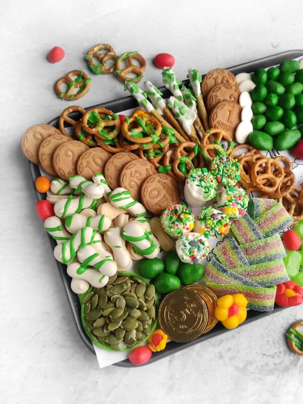 festive green and gold foods, easy holiday snacks, green and white appetizer board, Irish cheese and cracker tray