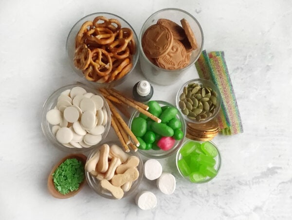DIY St Patricks Day board, Irish cheese board, rainbow charcuterie board, leprechaun charcuterie board, pot of gold snacks, gold coin chocolates, St Patricks Day dessert board, St Patricks Day candy board