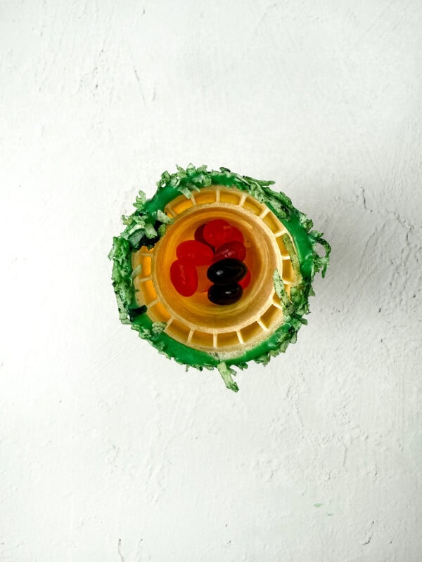 Top-down view of the inside of the ice cream cone filled with jelly beans
