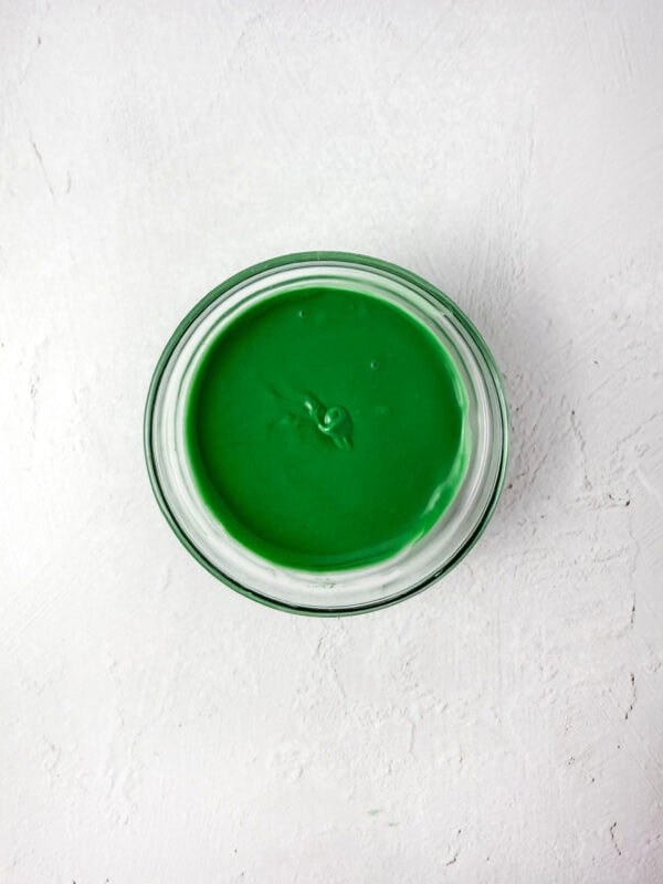 Bowl of melted green candy coating