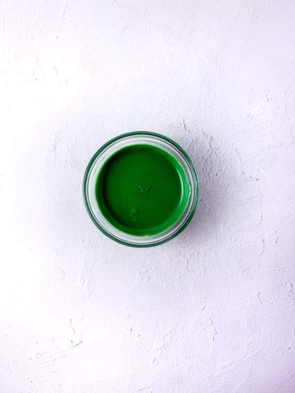 melted wiltons green chocolate wafers for piping
