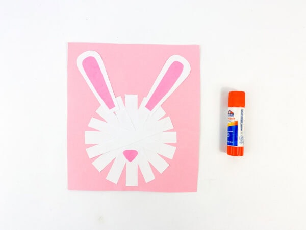The bunny’s face taking shape with ears and nose attached to the paper.