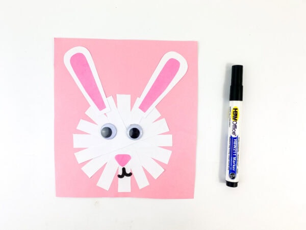 A black marker drawing the bunny’s mouth.