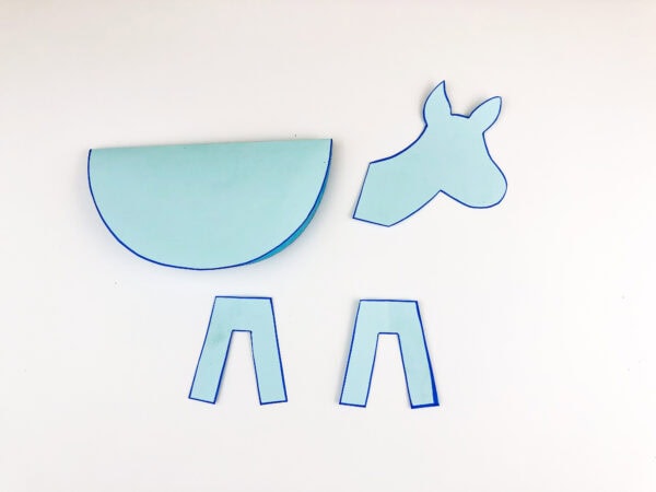 Outlined donkey pieces with blue marker.
