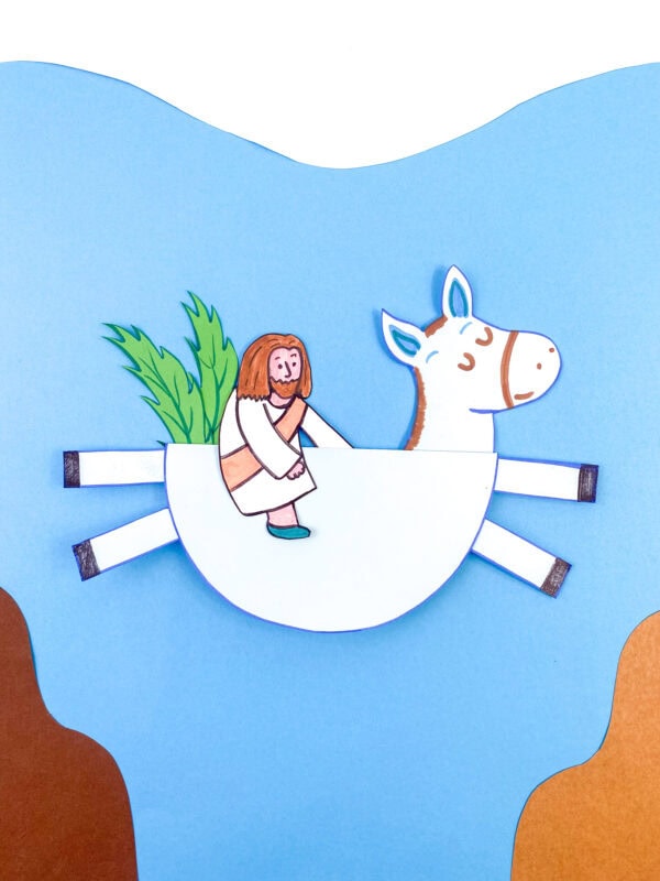 Handmade paper craft of Jesus on a donkey