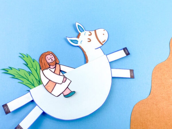 Handmade paper craft of Jesus on a donkey