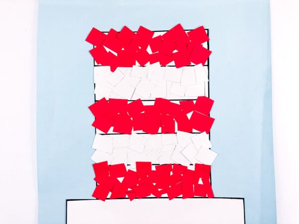 Hat partially covered with red and white squares