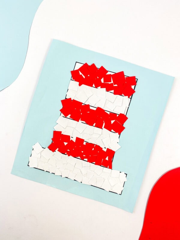 The final craft piece with the hat fully covered in red and white squares