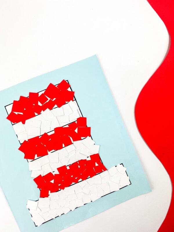 The final craft piece with the hat fully covered in red and white squares