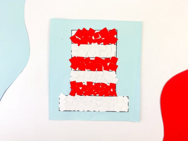 The final craft piece with the hat fully covered in red and white squares