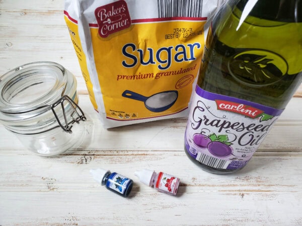 Sugar scrub ingredients on white wooden table