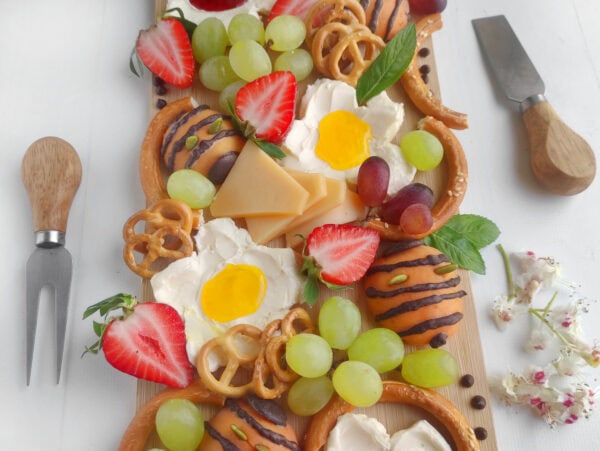 flower blossoms charcuterie fruit and cheese tray