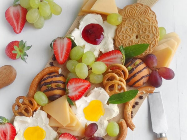 flower blossoms charcuterie fruit and cheese tray