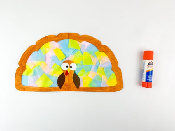 Turkey with colorful tissue paper background.